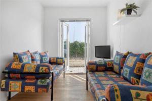 Μια τηλεόραση ή/και κέντρο ψυχαγωγίας στο 8112-Ronde-Strandvejen-50