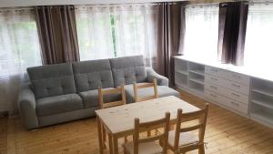 Posedenie v ubytovaní Apartamenty i Pokoje przy Parku