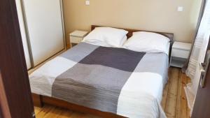 Posteľ alebo postele v izbe v ubytovaní Apartamenty i Pokoje przy Parku