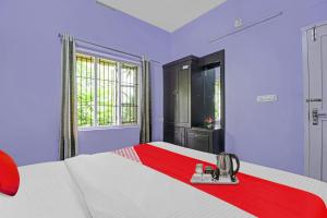 Postel nebo postele na pokoji v ubytování Collection O Clement Holydays + 27 fotografií