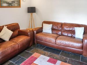 Posezení v ubytování Holly Cottage