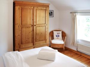 Postel nebo postele na pokoji v ubytování Holly Cottage