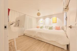 Ένα ή περισσότερα κρεβάτια σε δωμάτιο στο Hyehwamun Myeongdong Stay, 3 min to Naksan Park, 8 min to DDP, 10 min to Gyeongbokgung, Daehak-ro, place for 6p