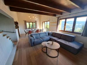 Posezení v ubytování Chalet Le Belvédère, vue exceptionnelle dans les Hautes Vosges