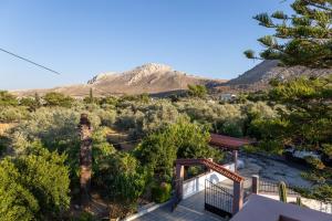 a view of a mountain from a house at Makiaris Villa in Archangelos