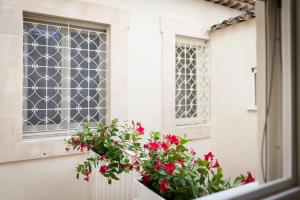Vonkajšia záhrada v ubytovaní Palazzo Montalbano