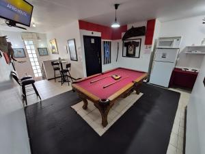 a room with a ping pong table in a kitchen at Quinta Casa Cedros in Monterrey