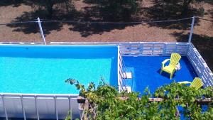 Bazén v ubytování LA PILA masseria salentina con piscina 3 camere con 6 PL si animali domestici nebo v jeho okolí