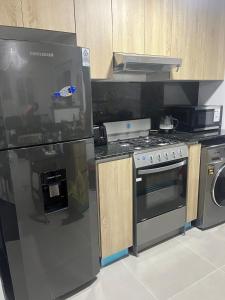 Una cocina o cocineta en Cozy Spot Condo