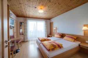 Postel nebo postele na pokoji v ubytování Pension Christophorus