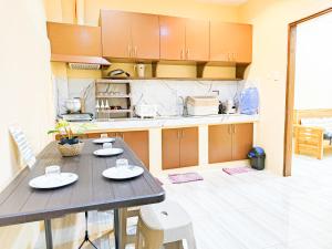 Η κουζίνα ή μικρή κουζίνα στο Panari Guest House