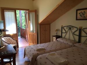 Posteľ alebo postele v izbe v ubytovaní Hotel Rural Casa Ana