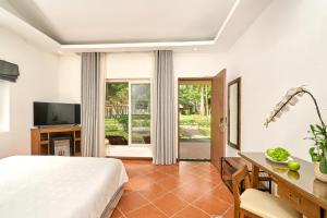 TV/trung tâm giải trí tại Famiana Green Villa - Complimentary Airport Shuttle