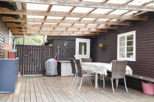En terrasse eller udendørsområde på 11158-1-Nykobing-Sj-Daemningen-15