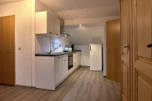 Kuchyň nebo kuchyňský kout v ubytování Haus Freigeist - zum Ortsblick + 6 fotografií