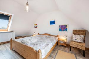 Postel nebo postele na pokoji v ubytování Haus Marschblick Neuenkirchen