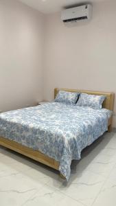 Postel nebo postele na pokoji v ubytování LAYCAM Home 1 pn
