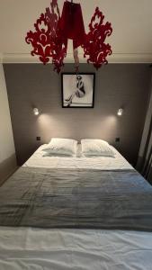 Ένα ή περισσότερα κρεβάτια σε δωμάτιο στο Renovated & cozy apartment +3 φωτογραφίες