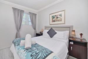 Katil atau katil-katil dalam bilik di Redsky self catering Agulhas