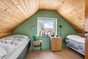 Ένα ή περισσότερα κρεβάτια σε δωμάτιο στο 725-Thyboron-Vesterhavsgade-111