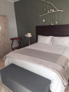 Postel nebo postele na pokoji v ubytování Sophia’s Cottage + 20 fotografií