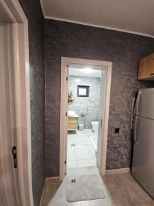 Koupelna v ubytování Pine Barn House + 36 fotografií