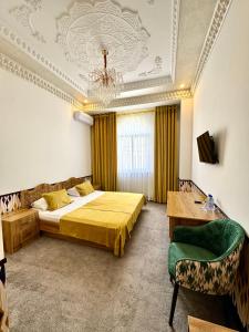 Ένα ή περισσότερα κρεβάτια σε δωμάτιο στο Khurjin Boutique Hotel