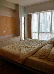 Ένα ή περισσότερα κρεβάτια σε δωμάτιο στο Apartment Setiabudi Skygarden