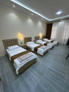 Кровать или кровати в номере Hotel Moon +14 фотографий