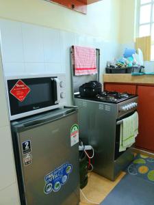 Η κουζίνα ή μικρή κουζίνα στο Cosy Homes II