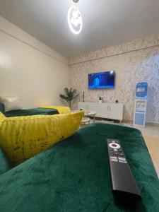 Μια τηλεόραση ή/και κέντρο ψυχαγωγίας στο Cosy Homes II