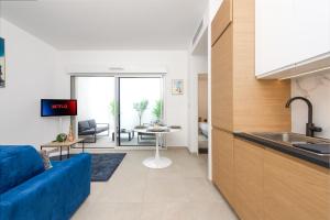 Kuchyň nebo kuchyňský kout v ubytování Appartement neuf - Patio intérieur - Parking - EF