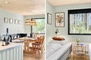 a living room with a couch and a dining room at LK2096-Lokken-Raevevej-4 in Løkken