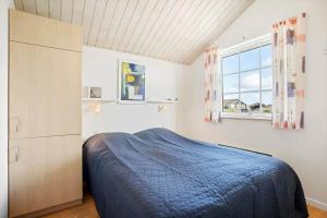 Postel nebo postele na pokoji v ubytování LK324-Lokken-Diget-29