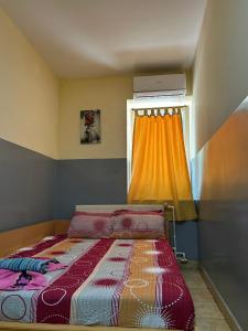 Ένα ή περισσότερα κρεβάτια σε δωμάτιο στο Villa Vera Rooms