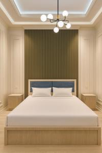 Ένα ή περισσότερα κρεβάτια σε δωμάτιο στο Modern Lux