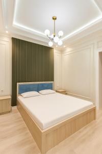 Ένα ή περισσότερα κρεβάτια σε δωμάτιο στο Modern Lux