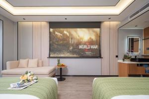 Μια τηλεόραση ή/και κέντρο ψυχαγωγίας στο Bohan Shenhua Riverside Resort Hotel