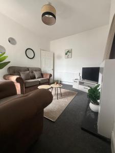 Χώρος καθιστικού στο ResiLets 1st Floor apartment