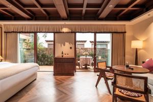 Χώρος καθιστικού στο La Danse Sacree Hotel