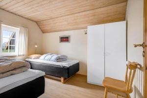 Ένα ή περισσότερα κρεβάτια σε δωμάτιο στο 377-Harboore-Fourmivej-56