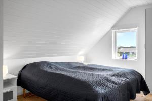 Ένα ή περισσότερα κρεβάτια σε δωμάτιο στο 389-Harboore-Fourmivej-76