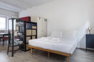 UNYCA - Charming Cozy Retreat Florence房間的床