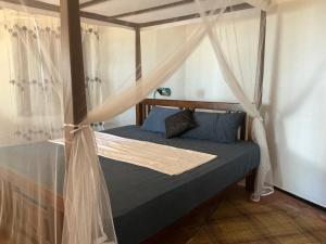 Voodi või voodid majutusasutuse Villa Araliya toas