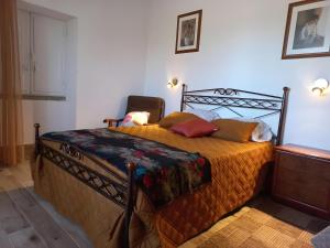 Postel nebo postele na pokoji v ubytování Casa De Campo Das Oliveiras