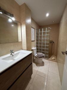 a bathroom with a sink and a toilet and a shower at Bungalow Paraiso in Callao Salvaje +37 photos