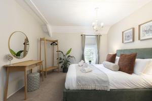 Ένα ή περισσότερα κρεβάτια σε δωμάτιο στο Charming 3-Bed Cottage by the River Usk