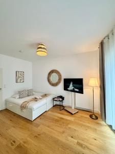 Ένα ή περισσότερα κρεβάτια σε δωμάτιο στο Le Studio Mail, Centre de Rennes