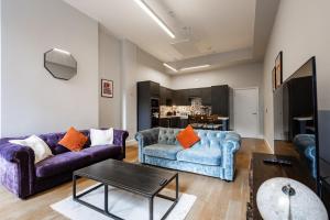 Et opholdsområde på Modern City Centre Apartment + 26 billeder