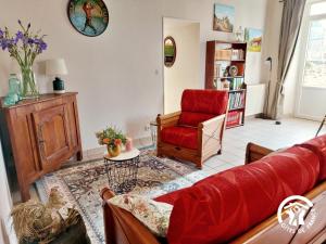 Un lugar para sentarse en La porte cochère, 2 chambres jusqu'à 4 personnes